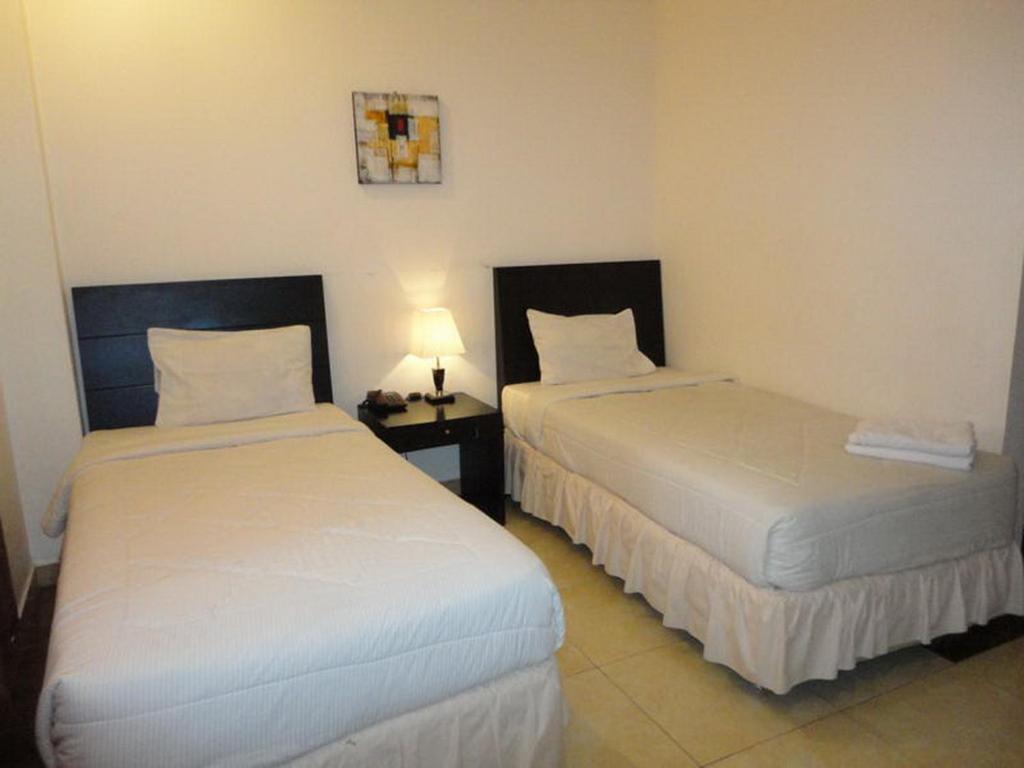 Grand Duta Hotel Palu Rum bild