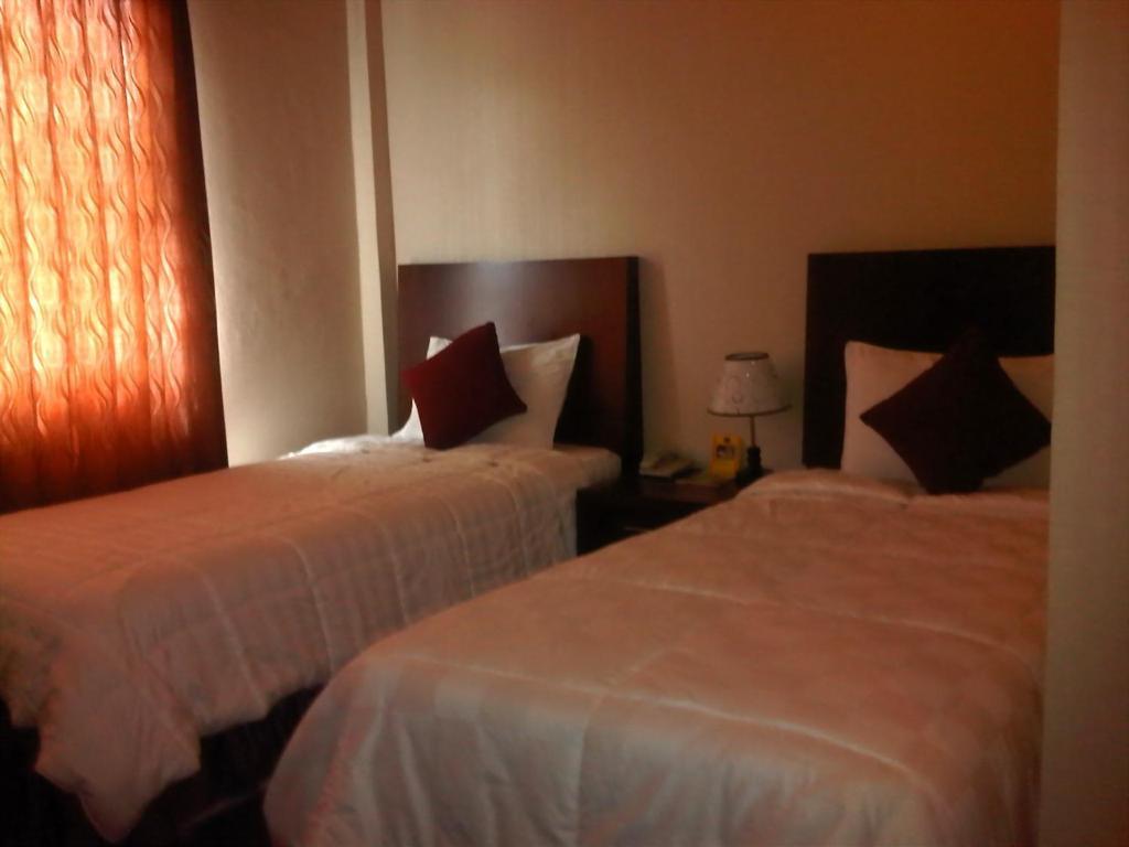 Grand Duta Hotel Palu Rum bild