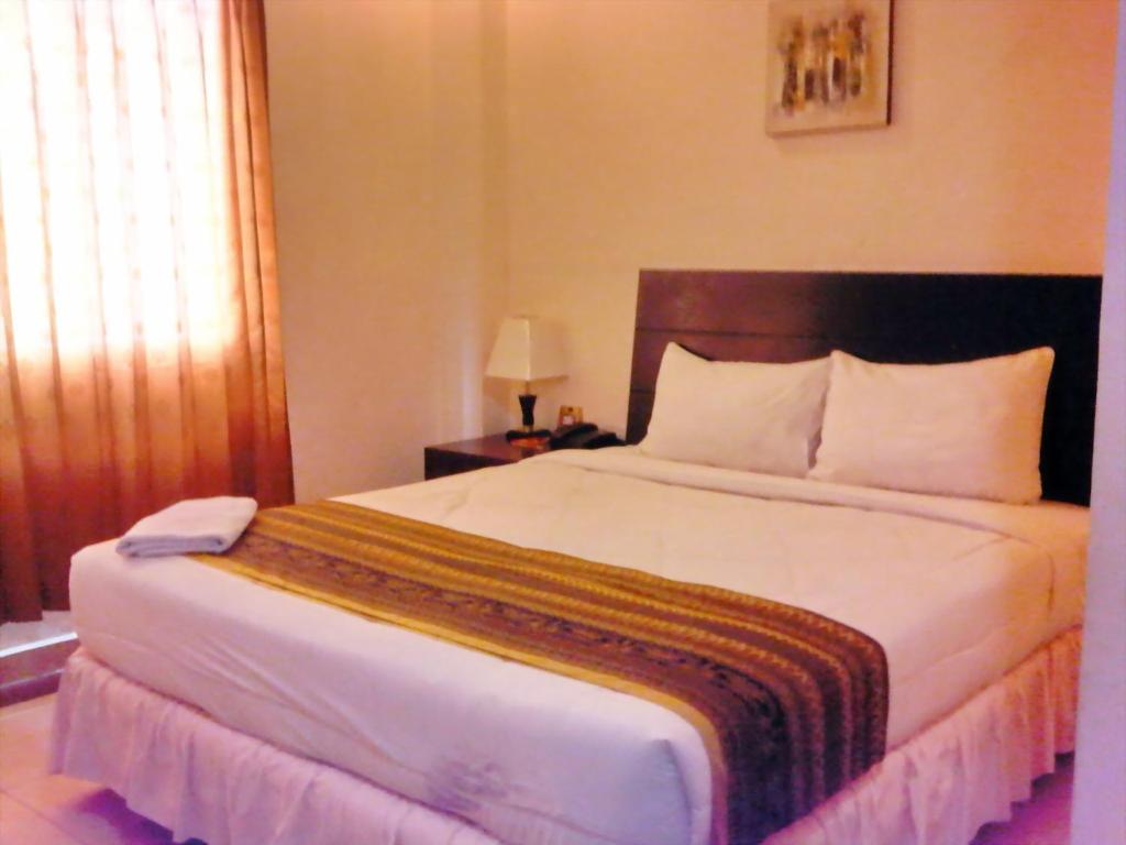 Grand Duta Hotel Palu Rum bild